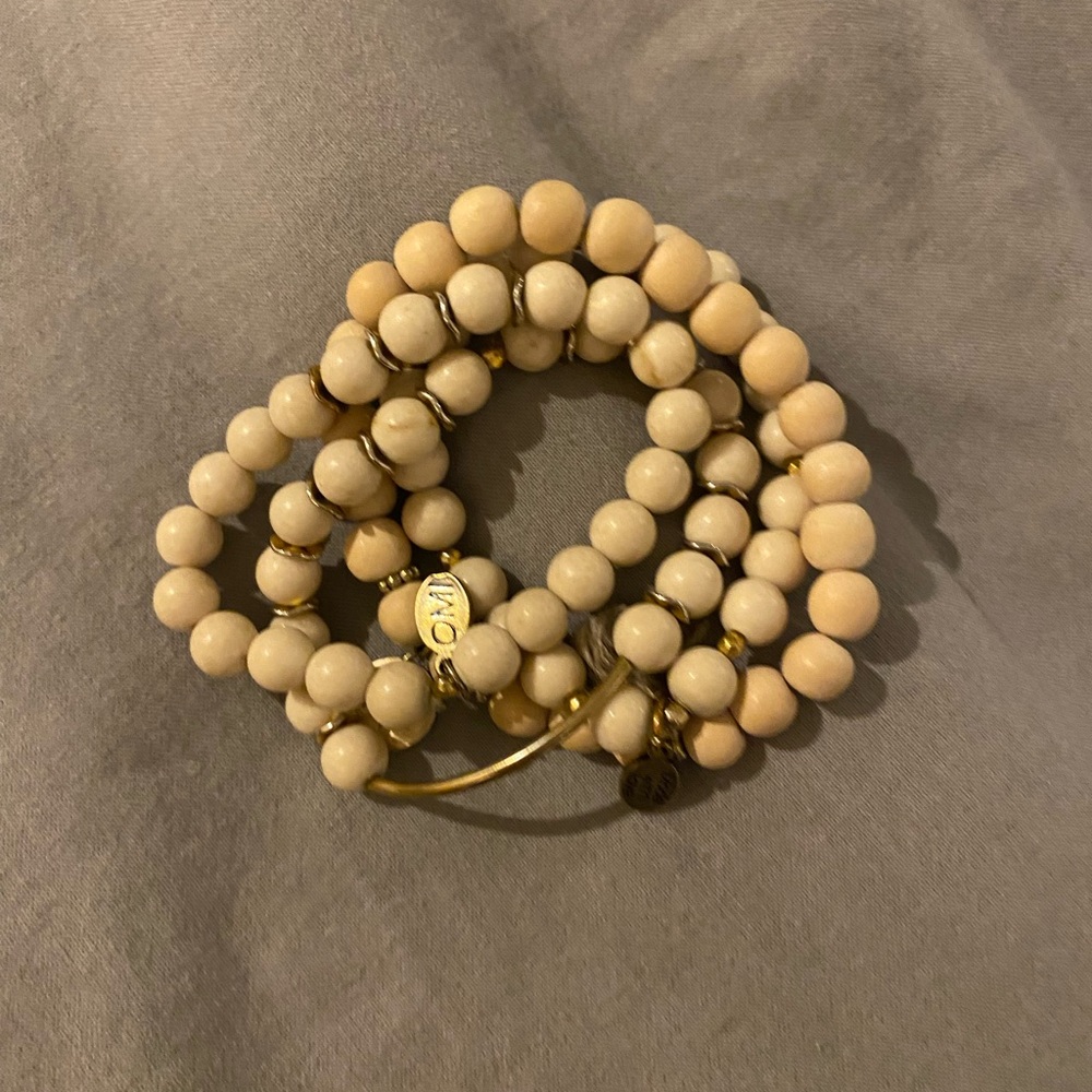 Stack of 4 beaded Omi bracelets. Light weight